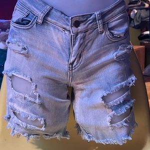 COPY - Light blue denim ripped shorts by Roma studio M